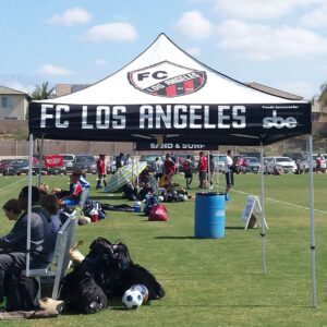 a pop-up canopy with a sports team logo
